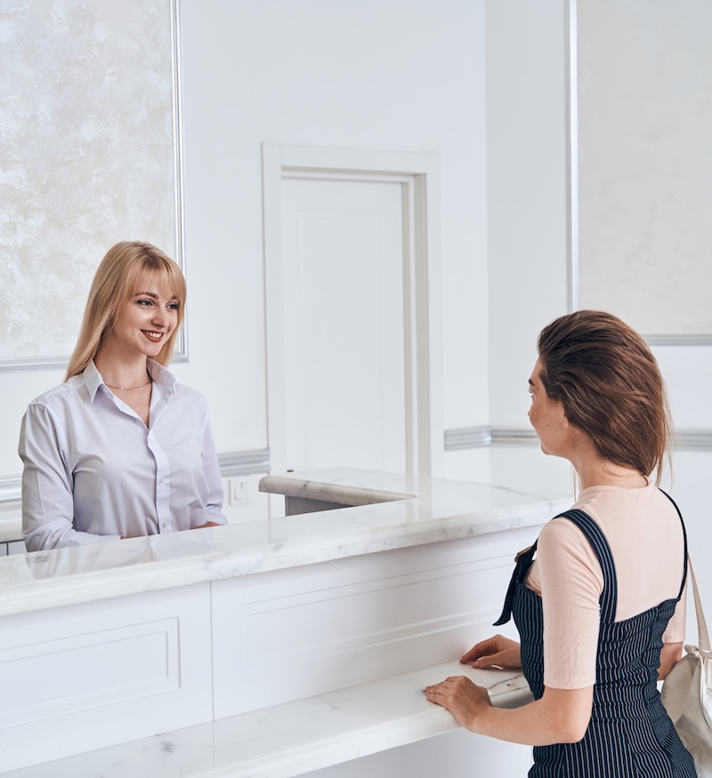 patient-at-Jumavo provider reception-desk